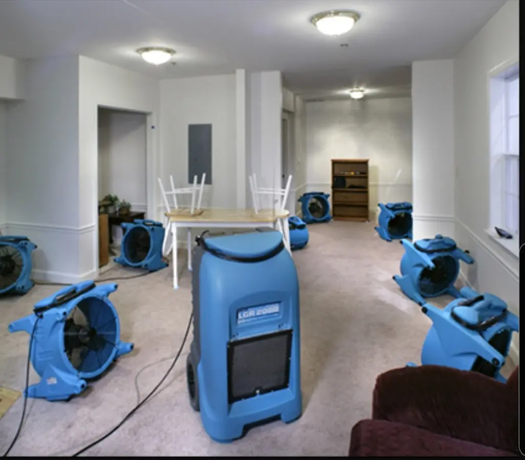 Air movers and dehumidifier setup for Water Damage Restoration in Utica